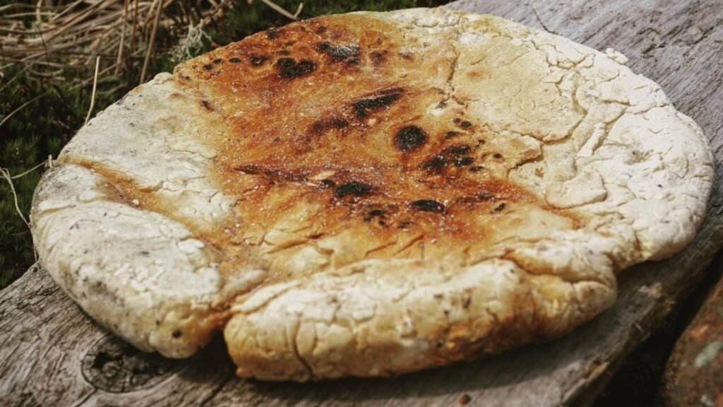 A traditional British bannock on wood