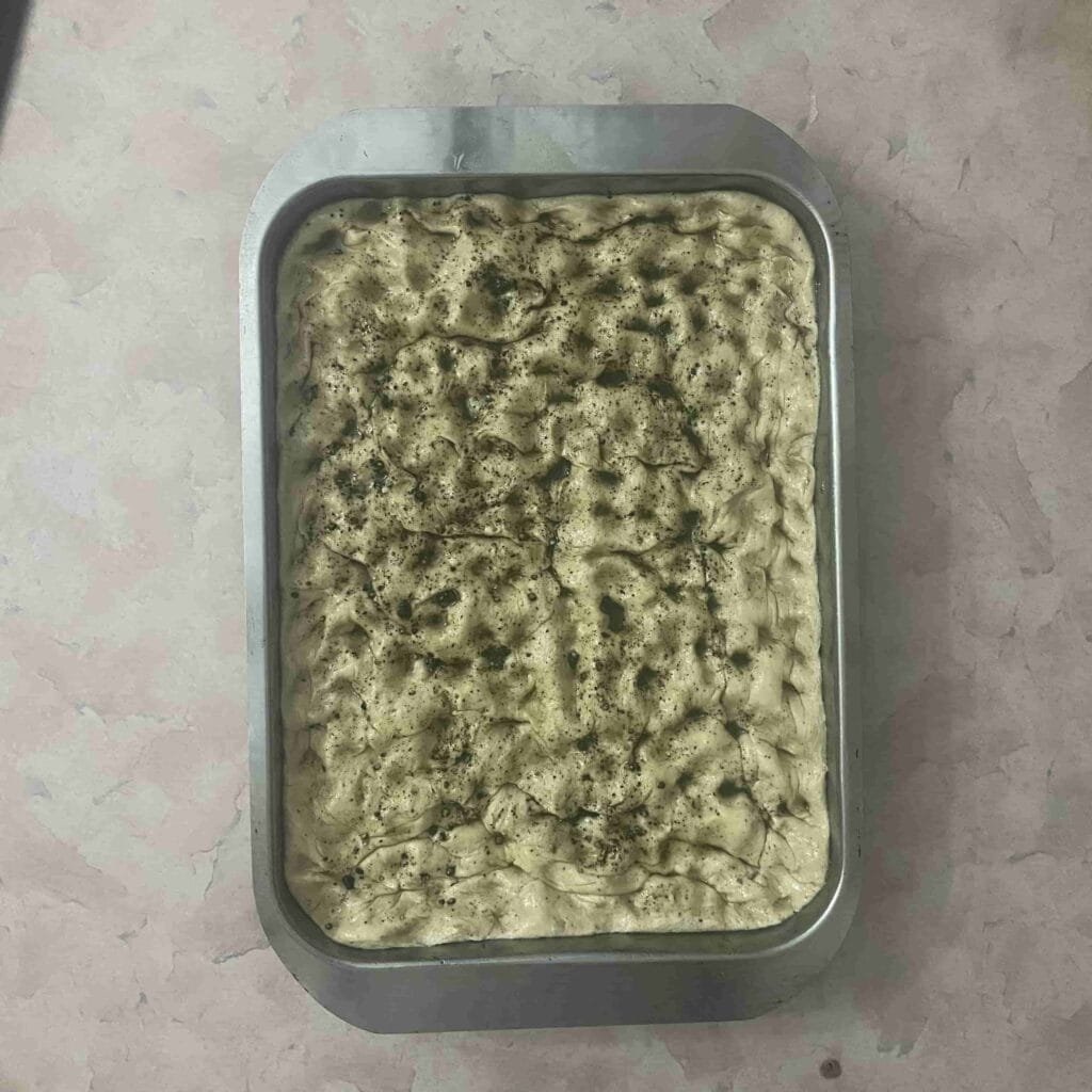 Dimple the black pepper focaccia dough