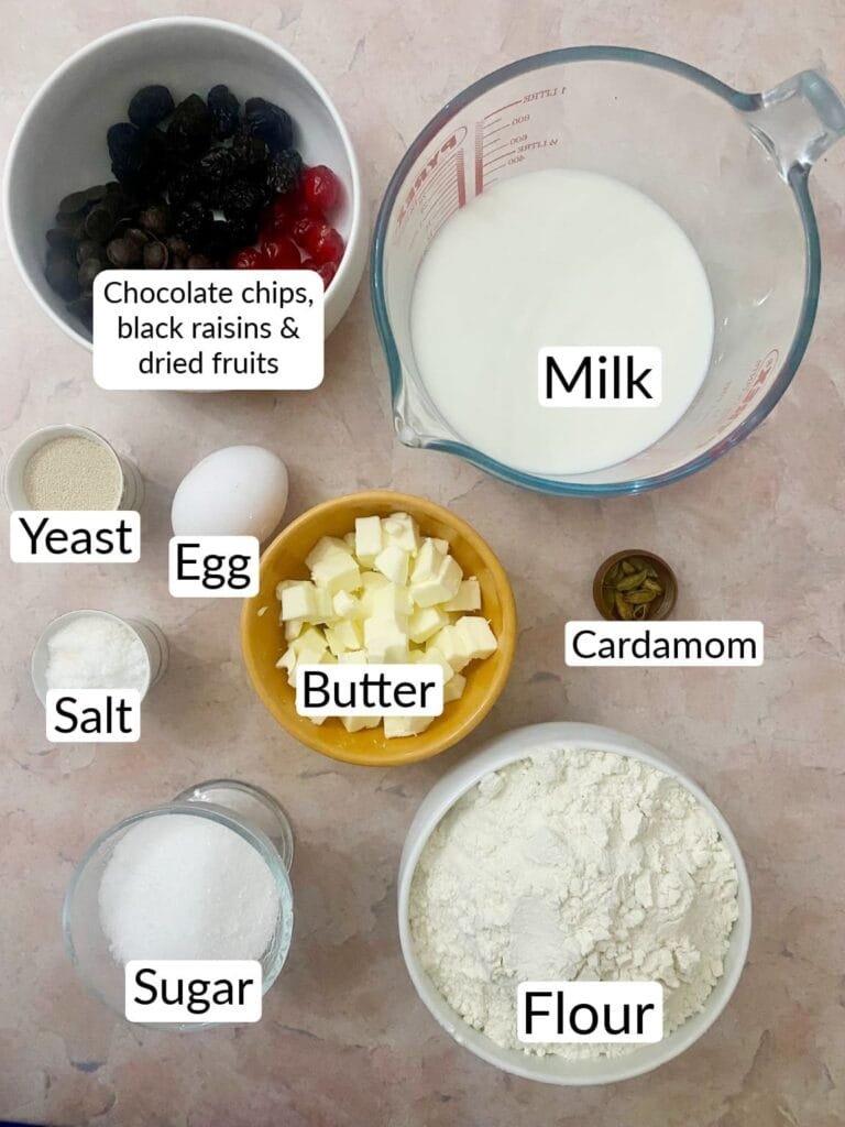 Julekake ingredients include: flour, sugar, milk, yeast, butter, cardamom and other ingredients.