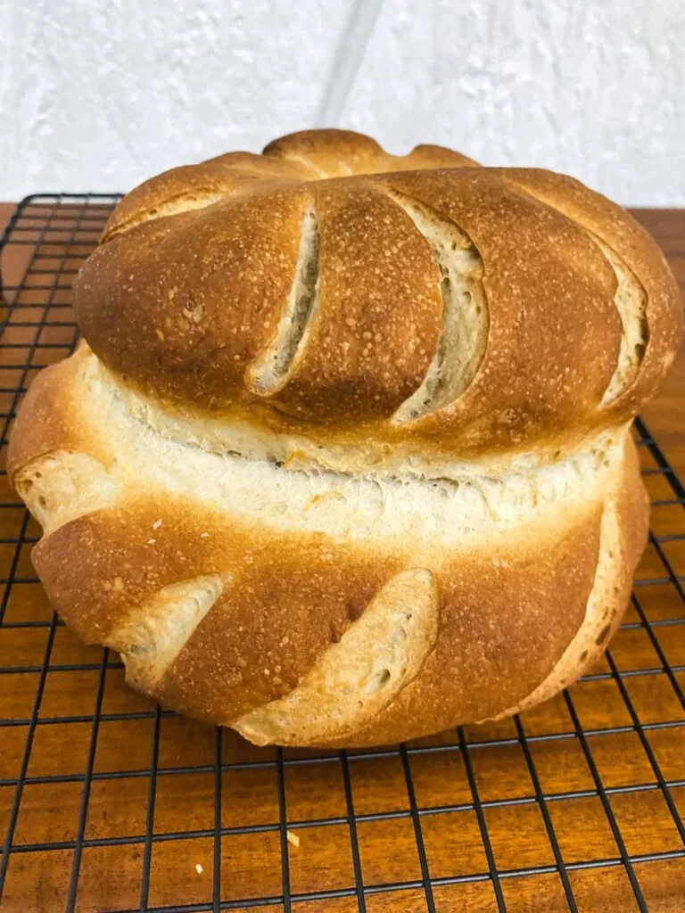 A close-up of a freshly baked cottage loaf