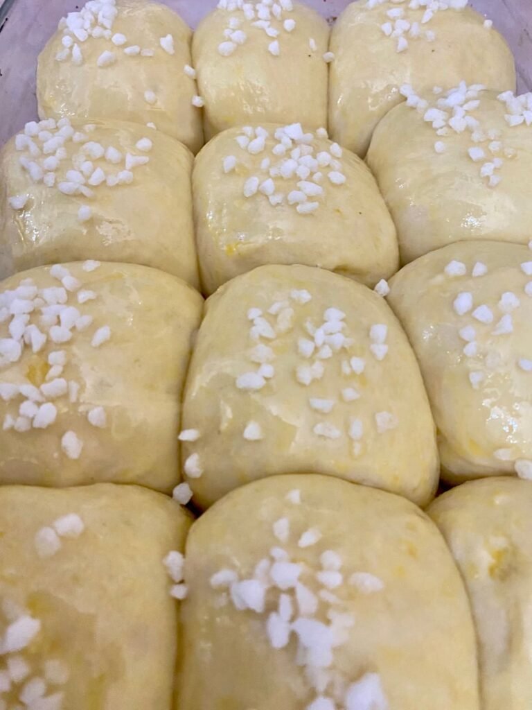 The dough is washed and covered just before baking