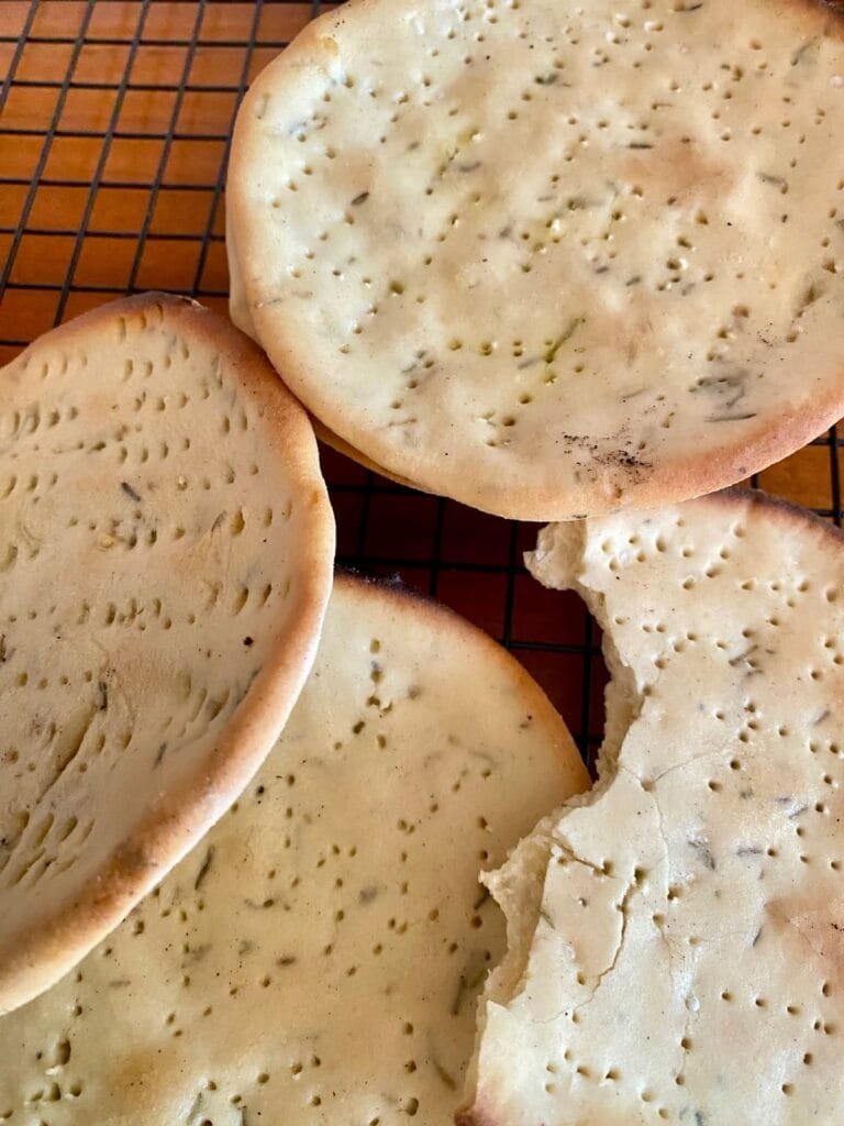 A close-up of communion bread on a colling rack