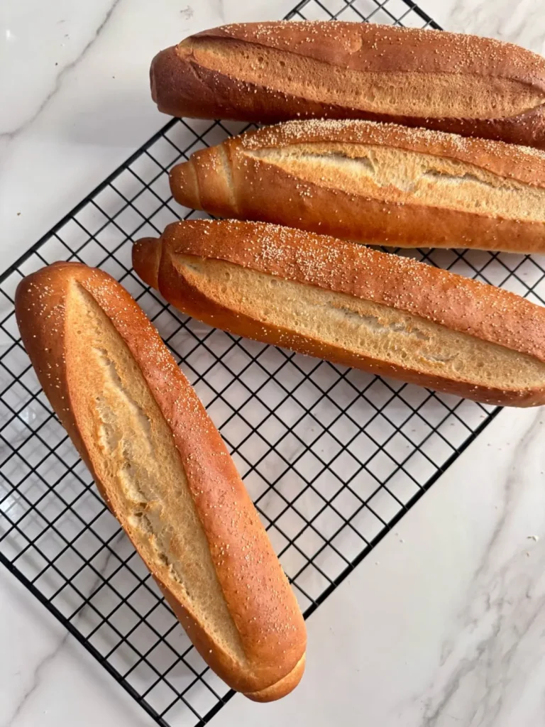 French hoagie rolls in cooling rack