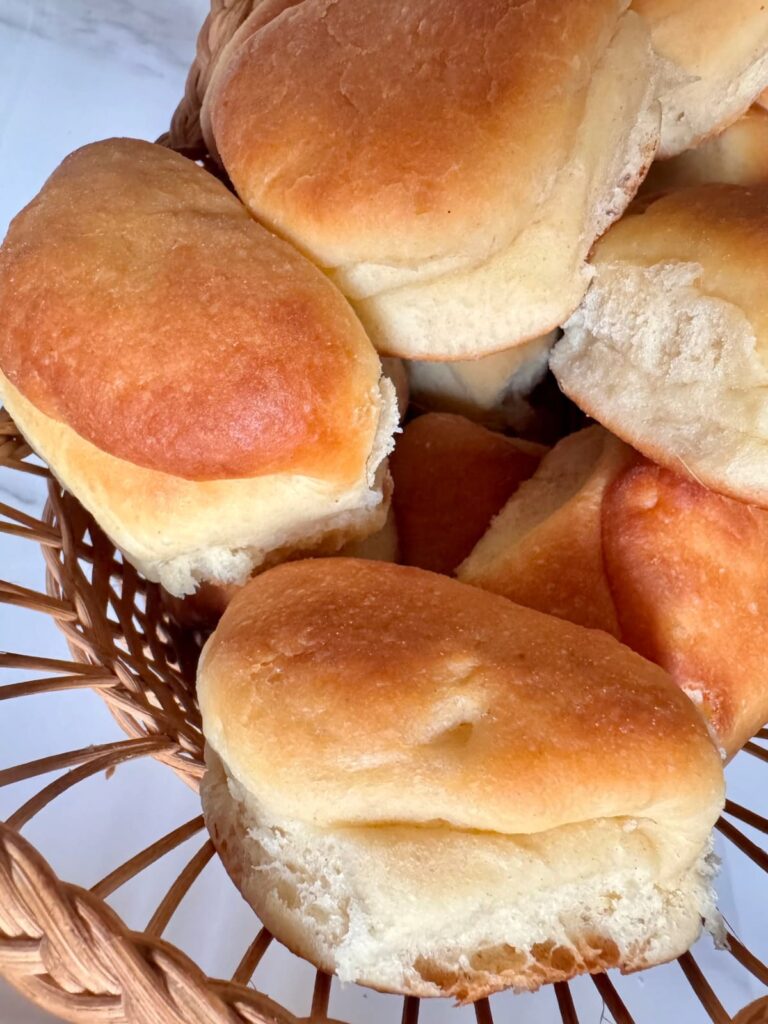 Parker House rolls in a breadbasket.