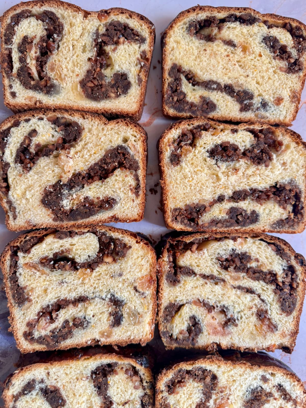 A high-angle view of thick slices of Cozonac bread.