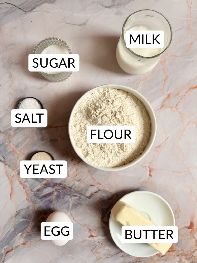 povitica bread dough ingredients include; milk, yeast, sugar, flour, and other rich dough ingredients.